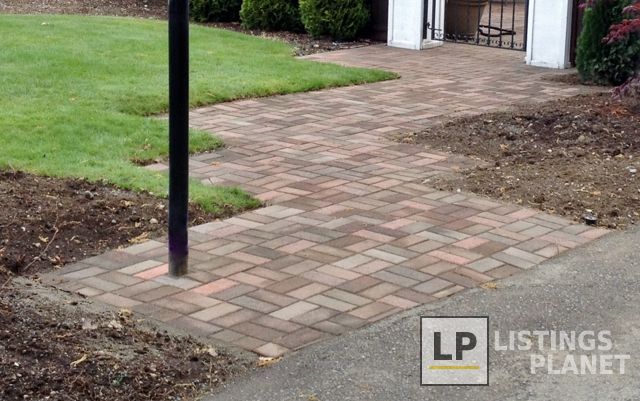 A Brick Walks into a Yard